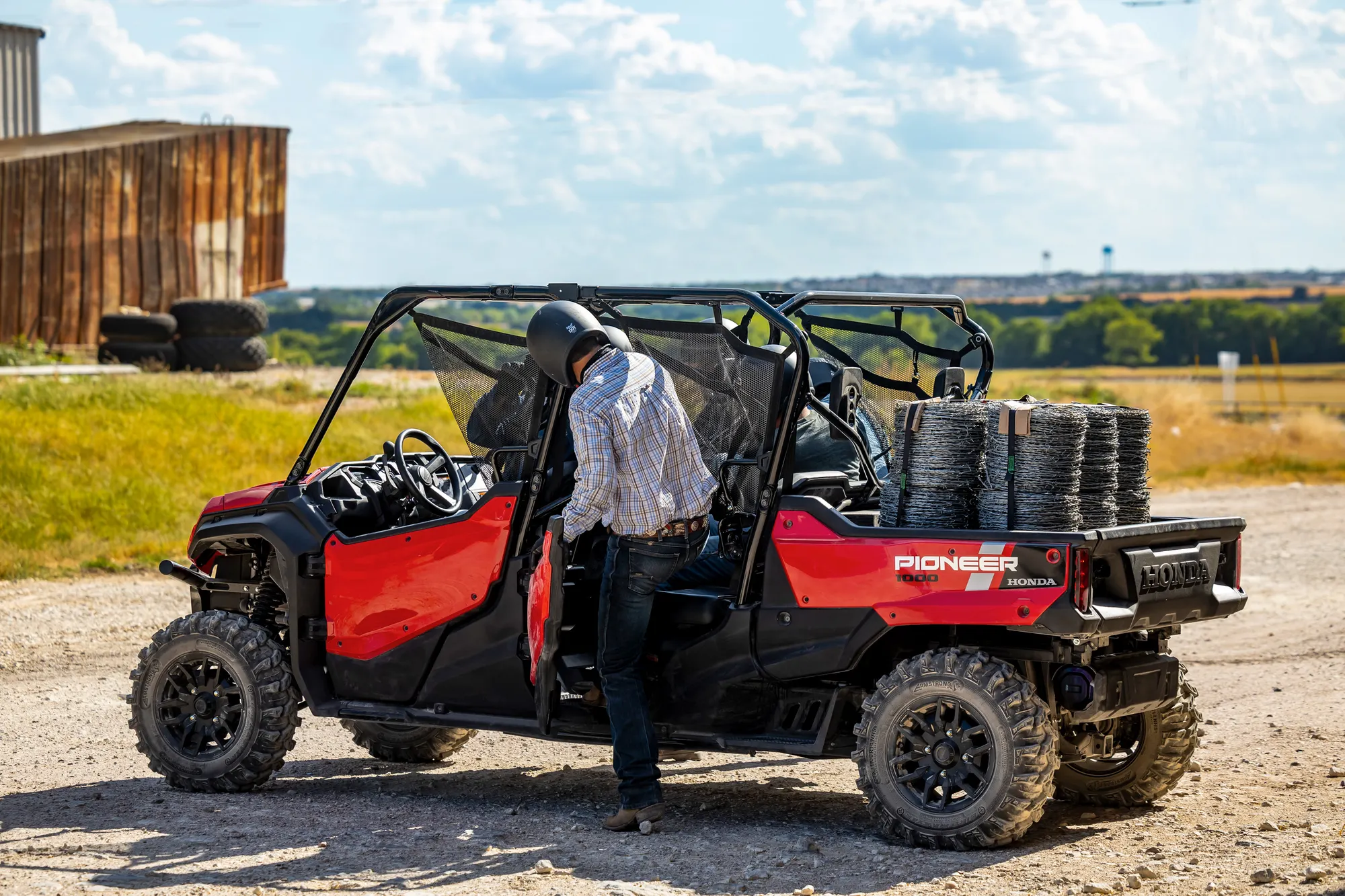 Honda Pioneer 1000-6 Deluxe Crew loaded with supplies